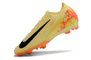 Chuteira Nike Mercurial Air Zoom Vapor 16 Elite FG Amarelo e Laranja, desenho moderno e cores vibrantes.