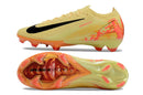 Chuteira Nike Mercurial Air Zoom Vapor 16 Elite FG Amarelo e Laranja com design aerodinâmico e sola em borracha.