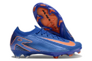 Chuteira Nike Mercurial Air Zoom Vapor 16 Elite FG Azul e Laranja em destaque, ideal para velocidade e controle em campo.