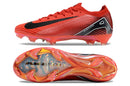 Chuteira Nike Mercurial Air Zoom Vapor 16 Elite FG Vermelha e Preto vista lateral e inferior