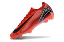 Chuteira Nike Mercurial Air Zoom Vapor 16 Elite FG Vermelha e Preto com design aerodinâmico e sistema Air Zoom.
