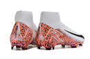 Chuteira Nike Mercurial Superfly 10 ELETRIC FG vista traseira com design colorido e detalhe em preto.