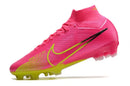 Chuteira Nike Mercurial superfly 9 Air Zoom Ultra FG Rosa e Verde com design vibrante e tecnologia de ponta.