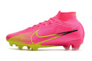 Chuteira Nike Mercurial superfly 9 Air Zoom Ultra FG Rosa e Verde lateral em fundo branco