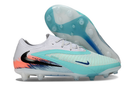 Chuteira Nike Phantom 6 Elite AG Azul - New United Pack, design moderno e tecnologia AG para campos sintéticos.