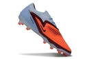 Chuteira Nike Phantom 6 Elite AG Vermelha e Azul - Scarry Good Pack em destaque, ideal para campos sintéticos.