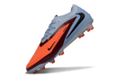 Chuteira Nike Phantom 6 Elite AG Vermelha e Azul - Scarry Good Pack, mostrando o design inovador e cores vibrantes.