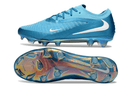 Chuteira Nike Phantom 6 Elite FG - Azul vista lateral e inferior destacando o design inovador e a cor vibrante.