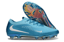 Chuteira Nike Phantom 6 Elite FG - Azul com design aerodinâmico para precisão e controle no campo.