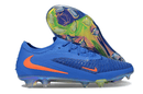 Chuteira Nike Phantom 6 Elite FG - Azul e Laranja com design arrojado e sola FG para tração em campos naturais.