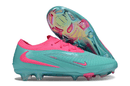 Chuteira Nike Phantom 6 Elite FG - Azul e Rosa em destaque, com design moderno e tecnologia para performance no campo.