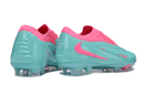 Chuteira Nike Phantom 6 Elite FG - Azul e Rosa, design arrojado e tecnologia para futebol de alto desempenho.