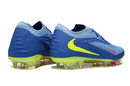 Chuteira Nike Phantom 6 Elite FG - Azul, Rosa e Verde, vista traseira com detalhes em amarelo e rosa.