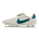 Chuteira Nike Premier 3 FG Branca e Verde vista lateral, ideal para controle e precisão em campo.