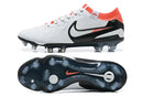 Chuteira Nike Tiempo Legend 10 FG - Branca, Vermelha e Preta com design moderno e sola de aderência.