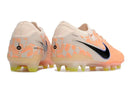 Chuteira Nike Tiempo Legend 10 FG - Laranja "United Pack" com design vibrante e tecnologia avançada para desempenho em campo.