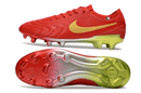 Chuteira Nike Tiempo Legend X Elite FG Vermelha vista lateral e inferior com design vibrante em vermelho.