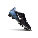 Chuteira Nike Total 90 FG Preta e Azul com design ergonômico e superfície de contato otimizada.