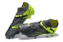Chuteira Puma Future 7 FG "Rush Pack" em preto e amarelo, ideal para jogadores que buscam velocidade e controle.