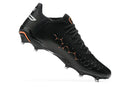 Chuteira Puma King Ultimate FG Preta - design elegante e atemporal, tecnologia premium para desempenho em gramados naturais.