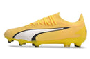 Chuteira Puma Ultra Ultimate FG Amarela com design leve e aderência para desempenho em campo.