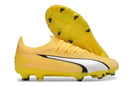Chuteira Puma Ultra Ultimate FG Amarela com sola de aderência e design inovador