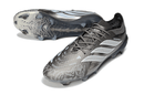 Chuteira Adidas Predator Elite FG 26 - "Finishers Steel" - Prateada em design prateado e tecnologia avançada.