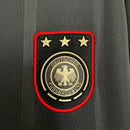 Emblema da Camisola Alemanha com três estrelas, símbolo do Deutscher Fussball-Bund.