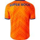 Camisola FC Porto away 24/25 Laranja com estampas geométricas e logo SUPER BOCK nas costas.