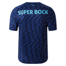 Camisola FC Porto third 24/25 Azul com estampado geométrico e nome Super Bock nas costas.