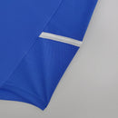 Detalhe da camisa Manchester United Away 02/04 Retro, ressaltando a costura na parte inferior.