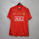 Camisa retrô Manchester United Home 07/08, com escudo e logo AIG, detalhe da final Moscovo 2008.