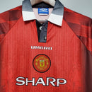 Camisa retrô Manchester United Home 1996 com logotipo Umbro e patrocinador Sharp.