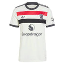 Camisa Manchester United terceira 24/25 com detalhes em vermelho e logotipo Snapdragon.