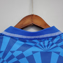 Camisolas Napoli Home 91/92 Retro, detalhe da gola em azul com padrão geométrico.