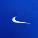 Camisola Brasil Away 1998 Retro com logo da Nike em destaque na cor branca sobre fundo azul.