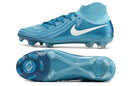 Nike Phantom Luna Elite NU FG Azul "Mad Ambition Pack" em azul, vista lateral e inferior, destacando design e tecnologia.