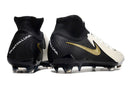 Nike Phantom Luna Elite NU FG Preta e Branca com detalhes em preto e dourado, ideal para futebol.