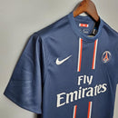 Camisa PSG Home 12/13 Retro Azul Marinho da OLYMPIC STORE com detalhes em branco e vermelho.