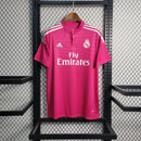 Camisola de futebol Real Madrid Away 14/15 na cor rosa, com logo da Emirates e detalhes brancos.