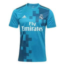 Camisa de futebol Real Madrid Third 17/18 na cor azul com detalhes modernos e logo da equipe.
