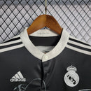 Camisola Real Madrid Third 14/15 Retro Preto com detalhes em branco e logo da Adidas.